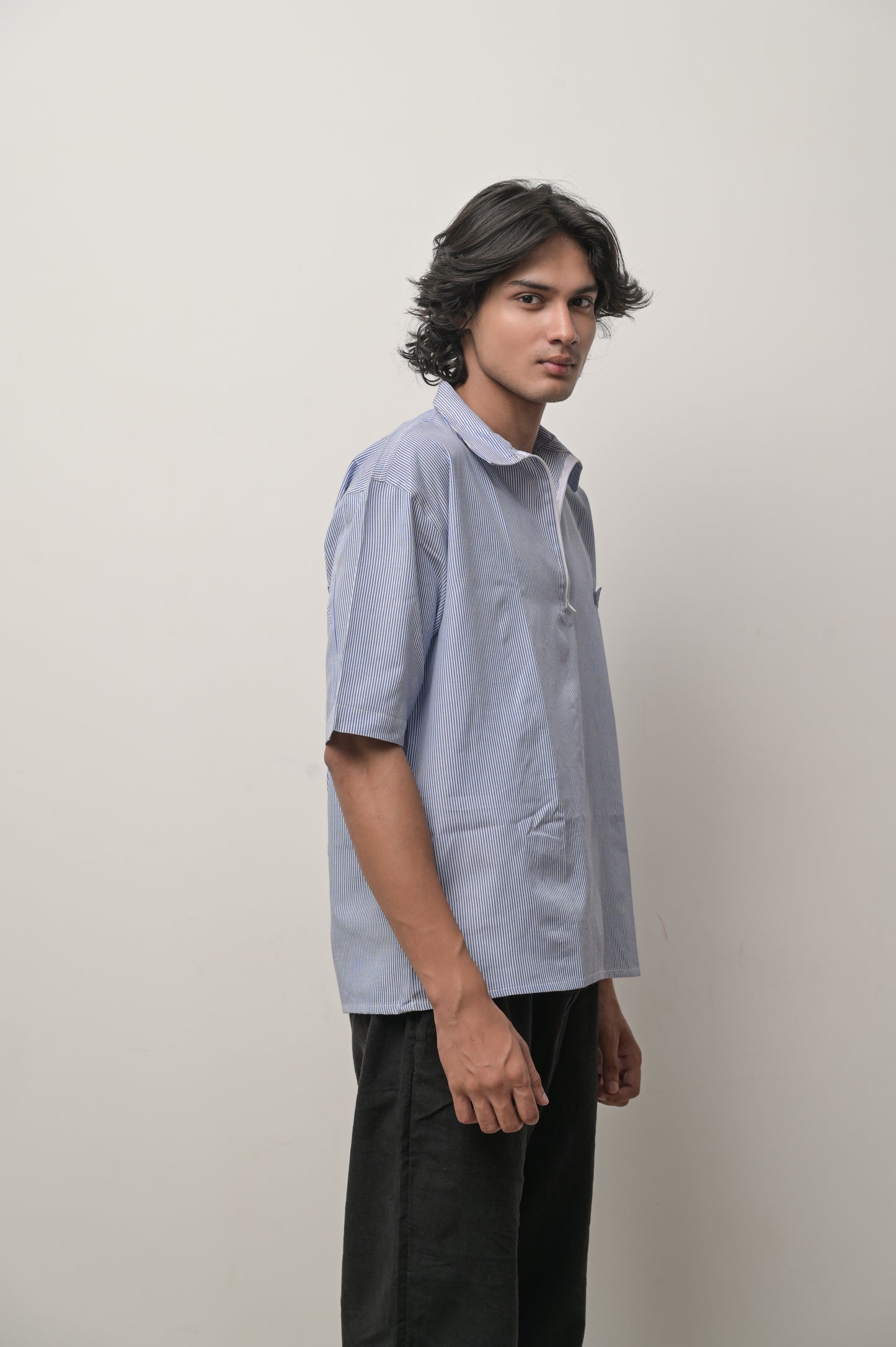 Blue striped shirt with brand logo